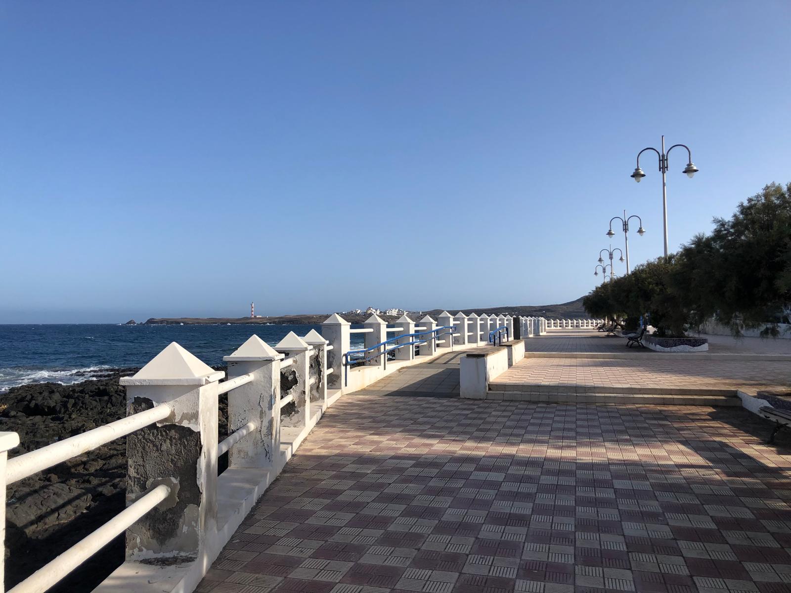A quiet waterfront promenade along Tenerife’s volcanic coast